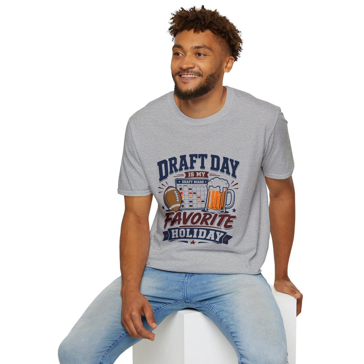 Draft Day Shirt, Sport Grey, worn by a model seated on a white block