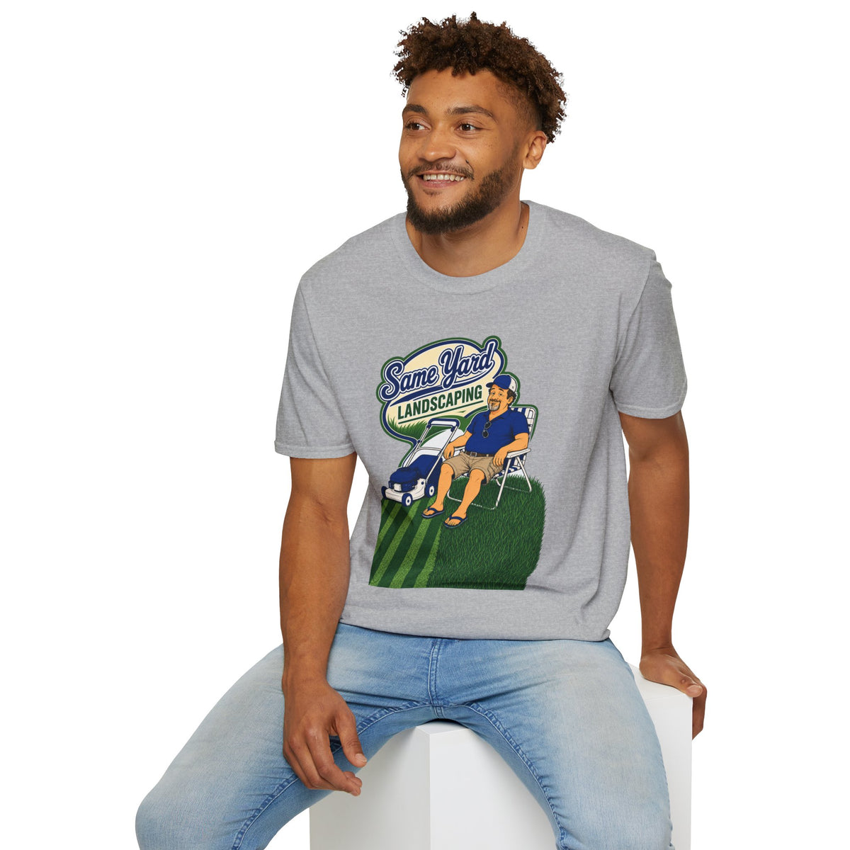 Same Yard Landscaping Shirt, Sport Grey, worn by a model seated on a white block