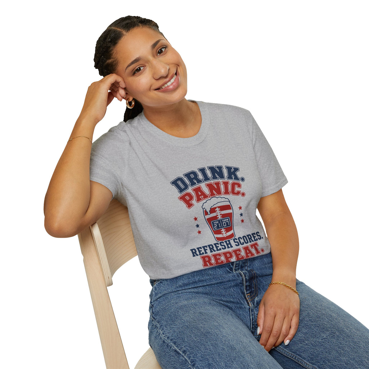 Drink Panic Refresh Scores Repeat Shirt, Sport Grey, worn by a model seated on a wooden chair
