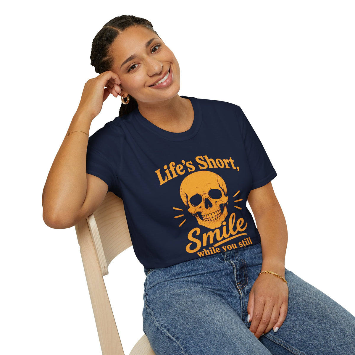 Life's Short, Smile While You Have Teeth Shirt, Navy, worn by a model seated on a wooden chair