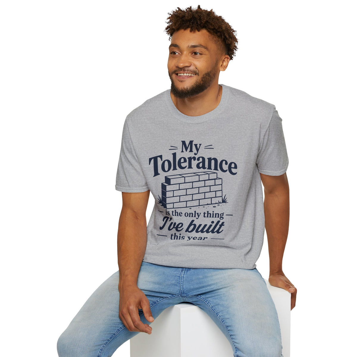 My Tolerance Is the Only Thing I've Built Shirt, Sport Grey, worn by a model seated on a white block
