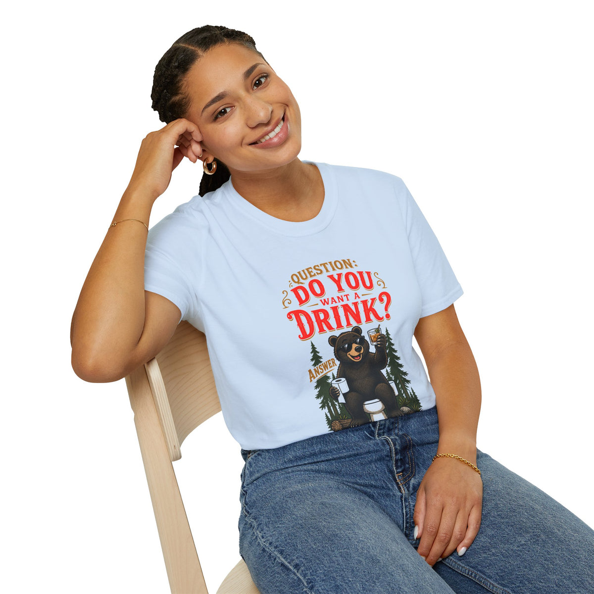 Does a Bear... Want a Drink? Shirt, Light Blue, worn by a model seated on a wooden chair