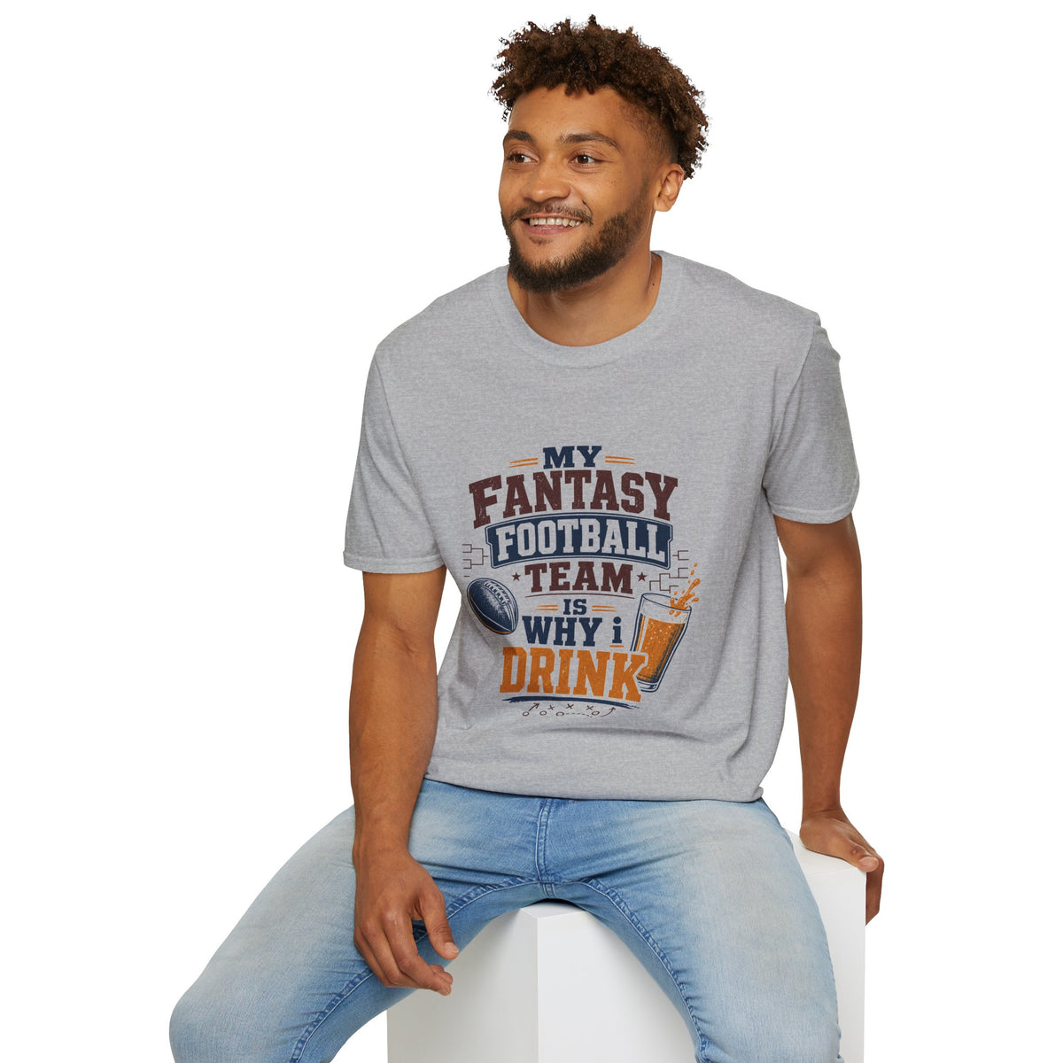 My Team Is Why I Drink Every Sunday Shirt, Sport Grey, worn by a model seated on a white block