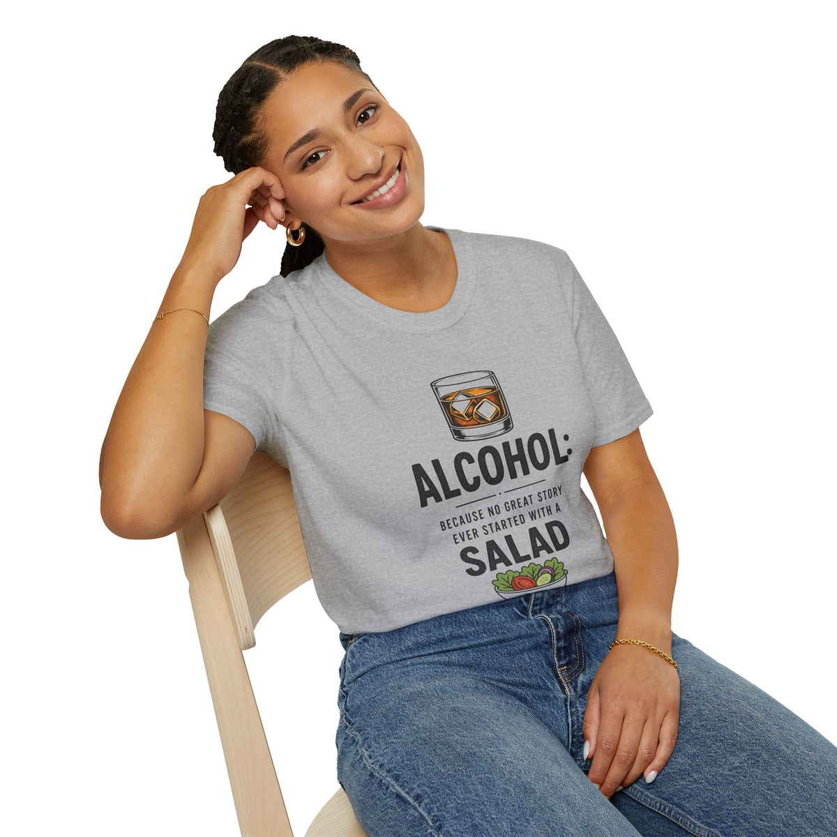 No Great Story Started With a Salad Shirt, Sport Grey, worn by a model seated on a wooden chair