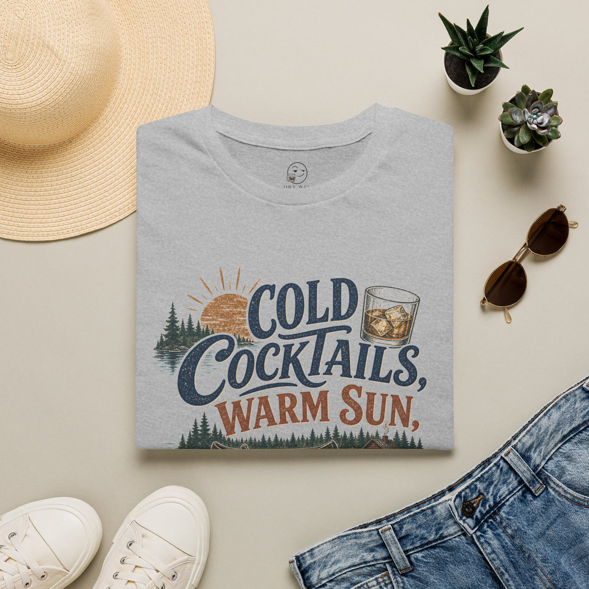 Cold Cocktails, Warm Sun Shirt, Sport Grey, folded flat lay styled with a straw hat, sunglasses, sneakers and denim