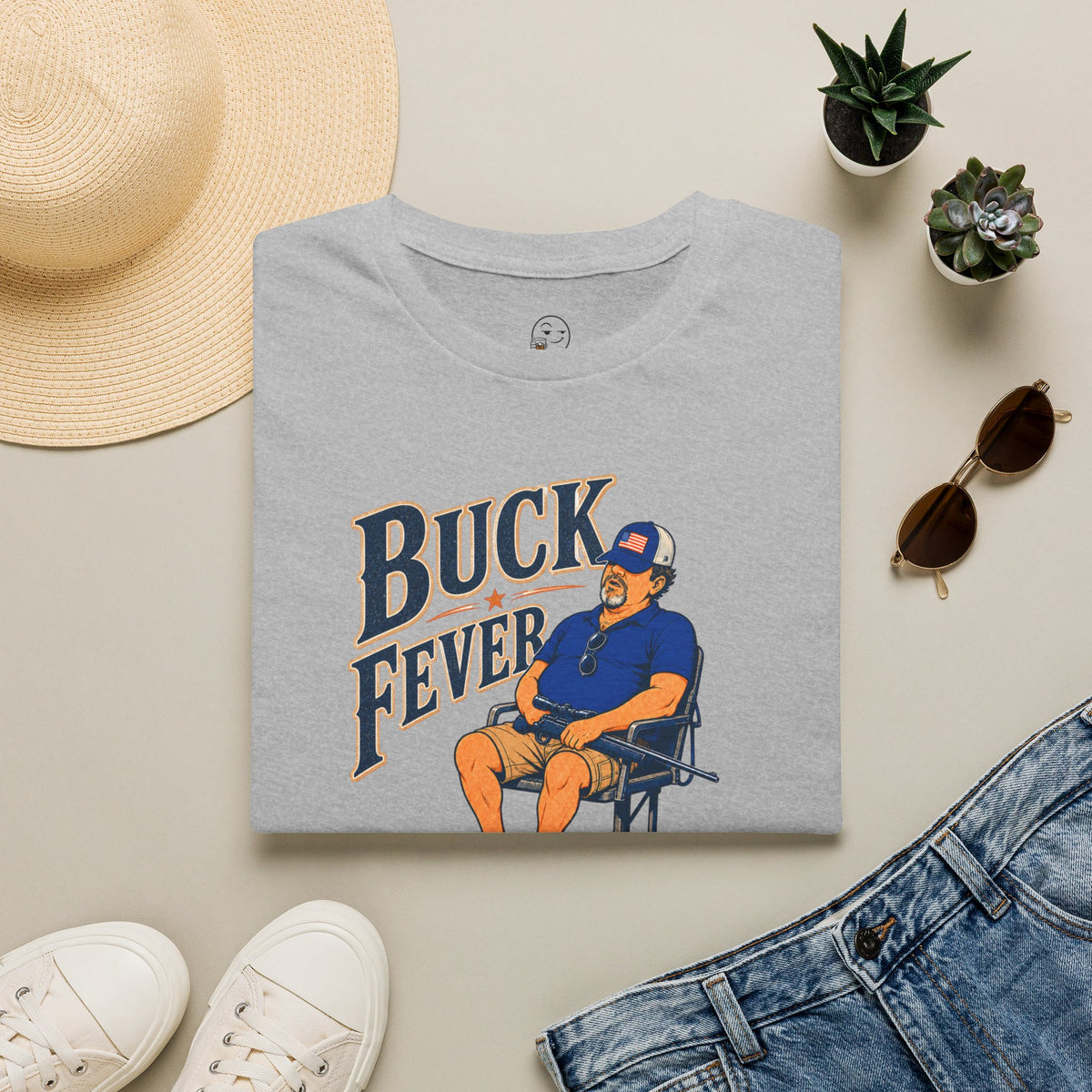 Buck Fever Outfitters Shirt, Sport Grey, folded flat lay styled with a straw hat, sunglasses, sneakers and denim