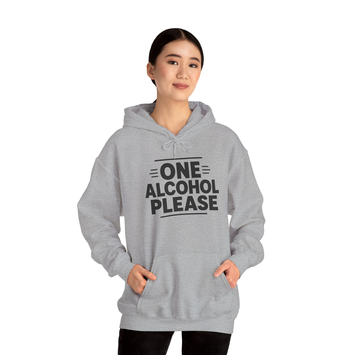 One Alcohol Please funny drinking hoodie, Sport Grey, worn by a standing model with dark trousers, hands in the front pouch pocket