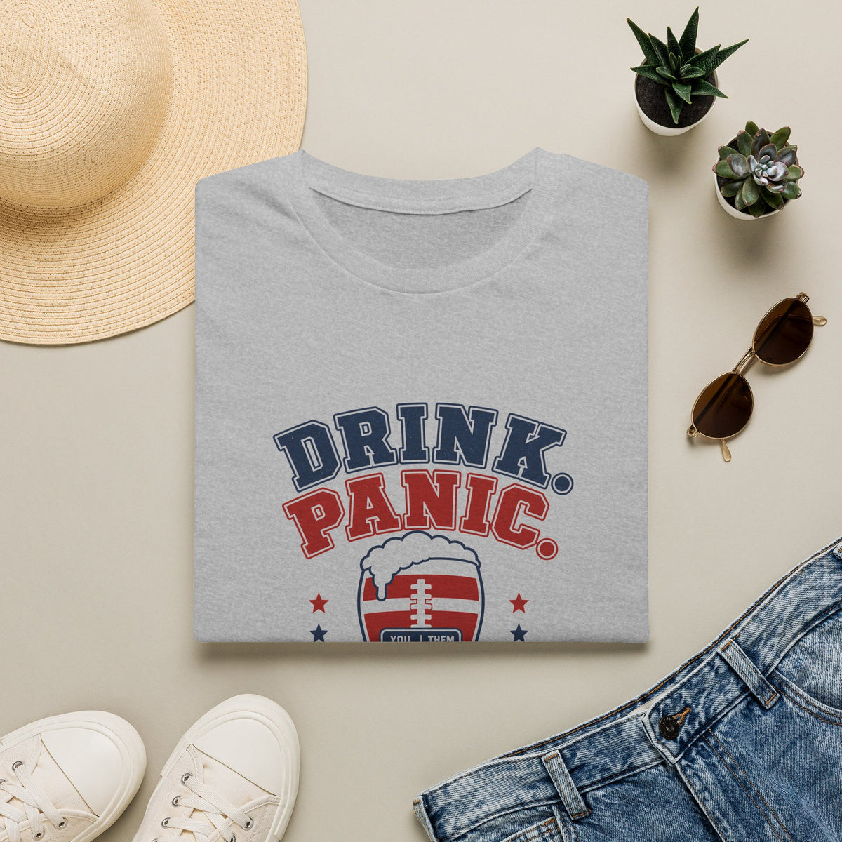 Drink Panic Refresh Scores Repeat Shirt, Sport Grey, folded flat lay styled with a straw hat, sunglasses, sneakers and denim