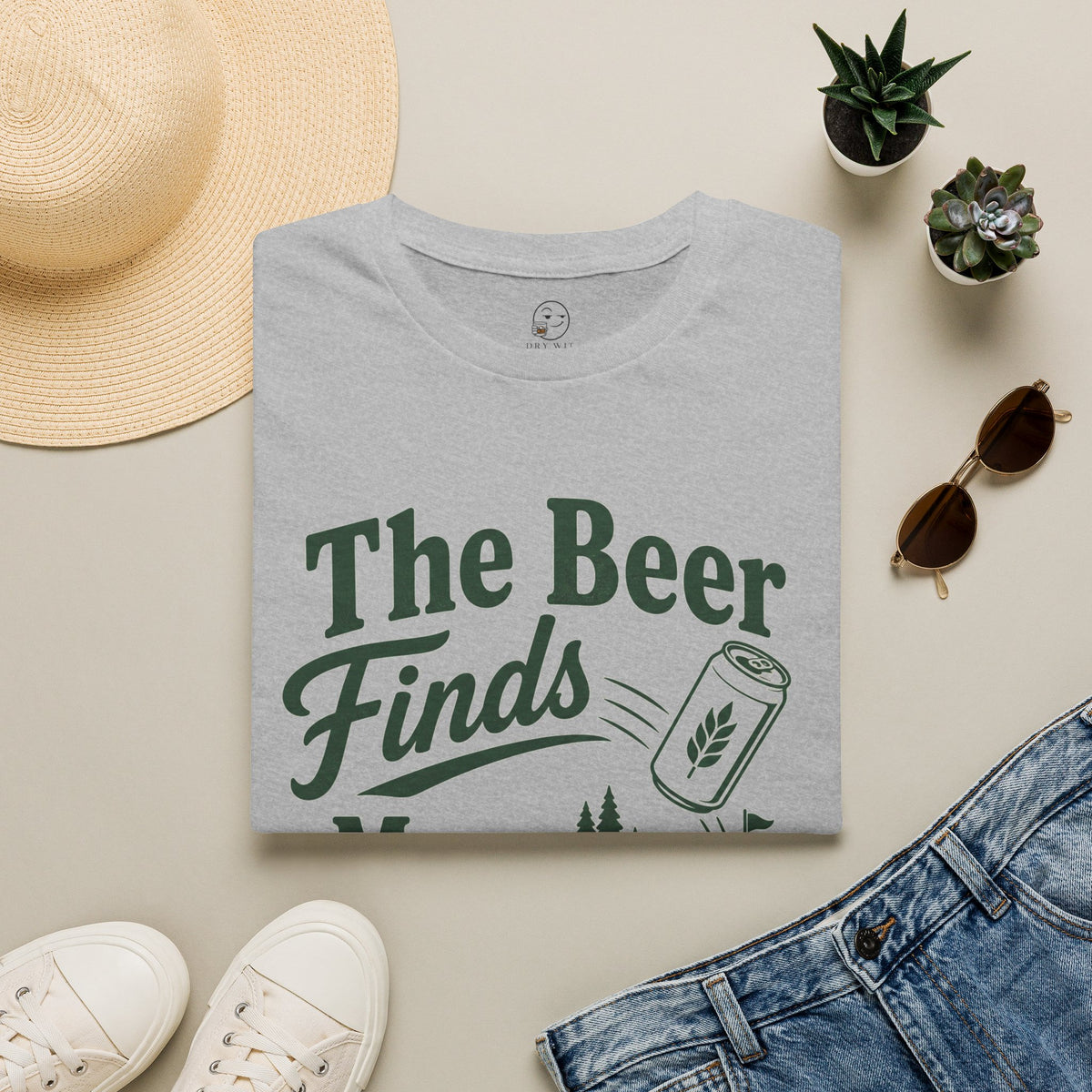The Beer Finds More Fairways Shirt, Sport Grey, folded flat lay styled with a straw hat, sunglasses, sneakers and denim