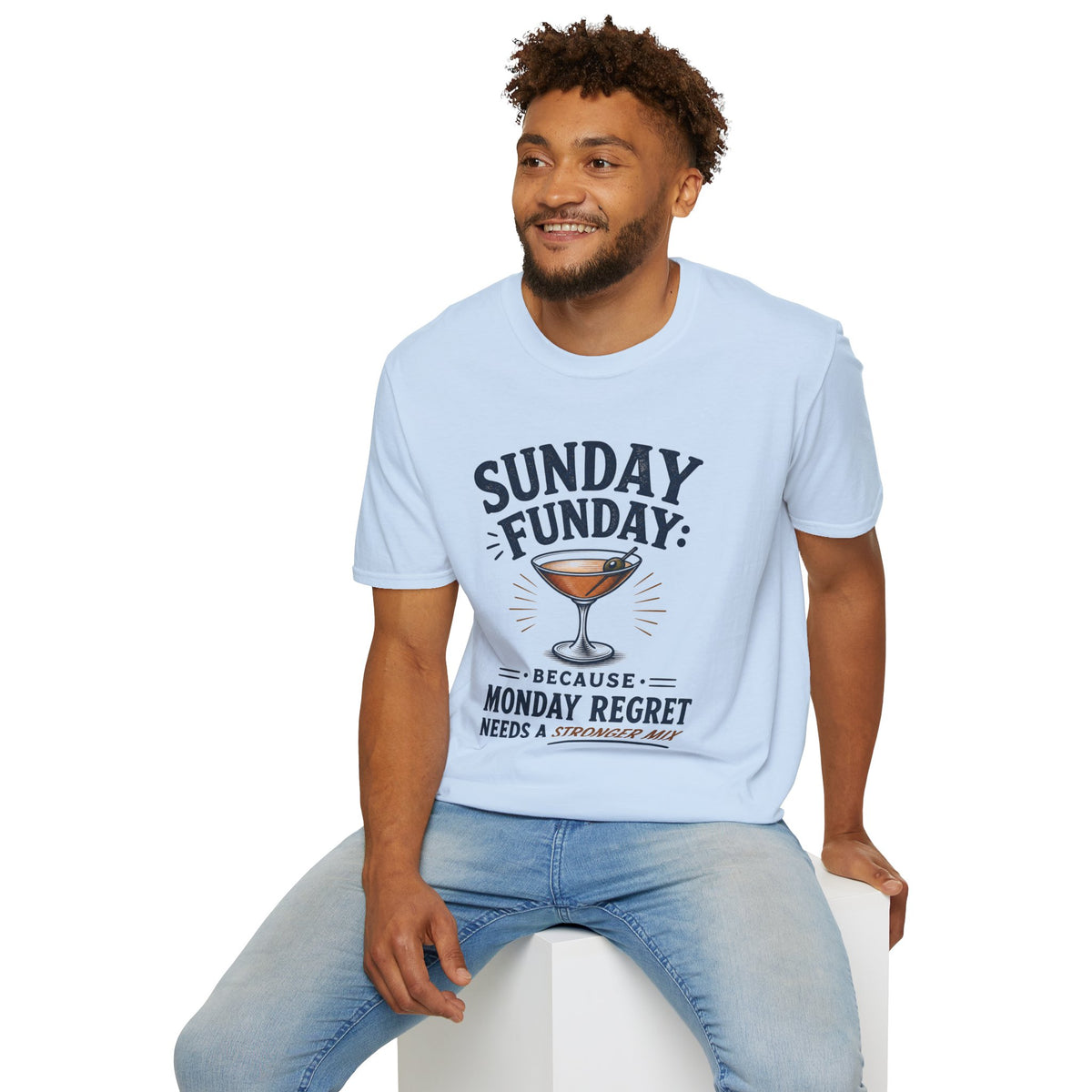 Sunday Funday Shirt, Light Blue, worn by a model seated on a white block