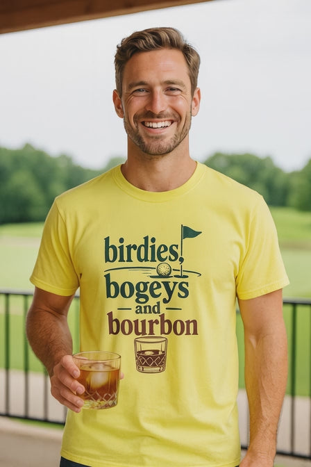 Video of a man in a yellow Birdies, Bogeys, and Bourbon funny golf shirt holding a whiskey glass outdoors