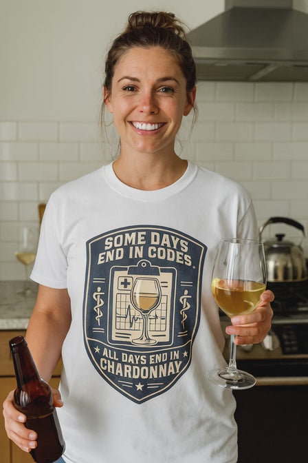 Video of a woman in a white Some Days End in Codes funny ER nurse shirt in a kitchen